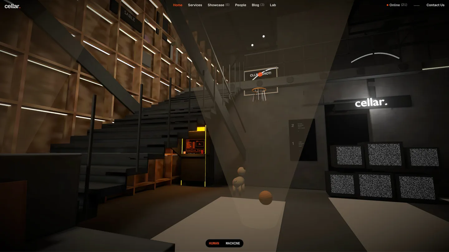 The office at the top of the home page: posters, a desk lamp and the stair
